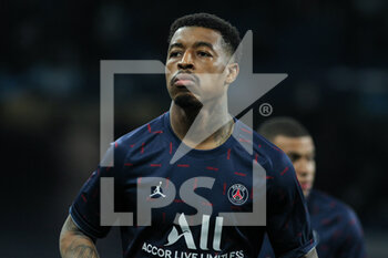 2022-03-09 - Presnel Kimpembe of PSG warms up during the UEFA Champions League, Round of 16, 2nd leg football match between Real Madrid and Paris Saint-Germain on March 9, 2022 at Santiago Bernabeu stadium in Madrid, Spain - REAL MADRID VS PARIS SAINT-GERMAIN - UEFA CHAMPIONS LEAGUE - SOCCER