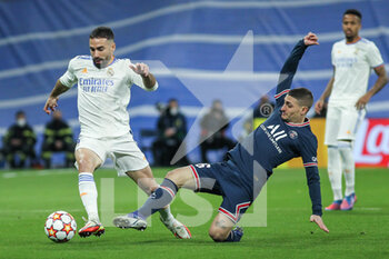 2022-03-09 - Daniel Carvajal of Real Madrid and Marco Verratti of PSG in action during the UEFA Champions League, Round of 16, 2nd leg football match between Real Madrid and Paris Saint-Germain on March 9, 2022 at Santiago Bernabeu stadium in Madrid, Spain - REAL MADRID VS PARIS SAINT-GERMAIN - UEFA CHAMPIONS LEAGUE - SOCCER