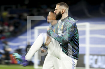 2022-03-09 - Karim Benzema of Real Madrid warms up before the UEFA Champions League, Round of 16, 2nd leg football match between Real Madrid and Paris Saint-Germain (PSG) on March 9, 2022 at Santiago Bernabeu stadium in Madrid, Spain - REAL MADRID VS PARIS SAINT-GERMAIN - UEFA CHAMPIONS LEAGUE - SOCCER
