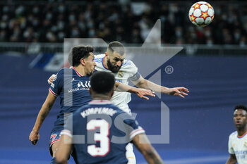 2022-03-09 - Marquinhos of PSG and Karim Benzema of Real Madrid in action during the UEFA Champions League, Round of 16, 2nd leg football match between Real Madrid and Paris Saint-Germain on March 9, 2022 at Santiago Bernabeu stadium in Madrid, Spain - REAL MADRID VS PARIS SAINT-GERMAIN - UEFA CHAMPIONS LEAGUE - SOCCER