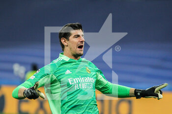 2022-03-09 - Thibaut Courtois of Real Madrid celebrates during the UEFA Champions League, Round of 16, 2nd leg football match between Real Madrid and Paris Saint-Germain on March 9, 2022 at Santiago Bernabeu stadium in Madrid, Spain - REAL MADRID VS PARIS SAINT-GERMAIN - UEFA CHAMPIONS LEAGUE - SOCCER
