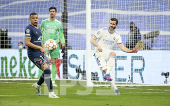 2022-03-09 - Nacho Fernandez of Real Madrid, Kylian Mbappe of PSG (left) during the UEFA Champions League, Round of 16, 2nd leg football match between Real Madrid and Paris Saint-Germain (PSG) on March 9, 2022 at Santiago Bernabeu stadium in Madrid, Spain - REAL MADRID VS PARIS SAINT-GERMAIN - UEFA CHAMPIONS LEAGUE - SOCCER