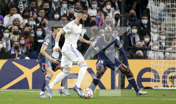 2022-03-09 - Karim Benzema of Real Madrid, Danilo Pereira of PSG during the UEFA Champions League, Round of 16, 2nd leg football match between Real Madrid and Paris Saint-Germain (PSG) on March 9, 2022 at Santiago Bernabeu stadium in Madrid, Spain - REAL MADRID VS PARIS SAINT-GERMAIN - UEFA CHAMPIONS LEAGUE - SOCCER