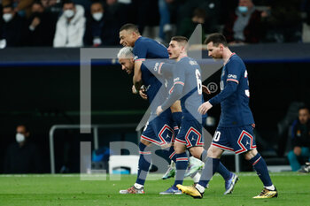 2022-03-09 - Kylian Mbappe of PSG celebrates a goal 0-1 with teammates during the UEFA Champions League, Round of 16, 2nd leg football match between Real Madrid and Paris Saint-Germain on March 9, 2022 at Santiago Bernabeu stadium in Madrid, Spain - REAL MADRID VS PARIS SAINT-GERMAIN - UEFA CHAMPIONS LEAGUE - SOCCER