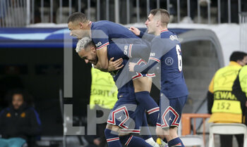 2022-03-09 - Kylian Mbappe of PSG celebrates his goal with Neymar Jr, Marco Verratti of PSG during the UEFA Champions League, Round of 16, 2nd leg football match between Real Madrid and Paris Saint-Germain (PSG) on March 9, 2022 at Santiago Bernabeu stadium in Madrid, Spain - REAL MADRID VS PARIS SAINT-GERMAIN - UEFA CHAMPIONS LEAGUE - SOCCER
