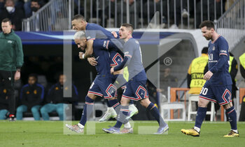 2022-03-09 - Kylian Mbappe of PSG celebrates his goal with Neymar Jr, Marco Verratti, Lionel Messi of PSG during the UEFA Champions League, Round of 16, 2nd leg football match between Real Madrid and Paris Saint-Germain (PSG) on March 9, 2022 at Santiago Bernabeu stadium in Madrid, Spain - REAL MADRID VS PARIS SAINT-GERMAIN - UEFA CHAMPIONS LEAGUE - SOCCER