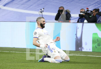 2022-03-09 - Karim Benzema of Real Madrid celebrates his goal during the UEFA Champions League, Round of 16, 2nd leg football match between Real Madrid and Paris Saint-Germain (PSG) on March 9, 2022 at Santiago Bernabeu stadium in Madrid, Spain - REAL MADRID VS PARIS SAINT-GERMAIN - UEFA CHAMPIONS LEAGUE - SOCCER