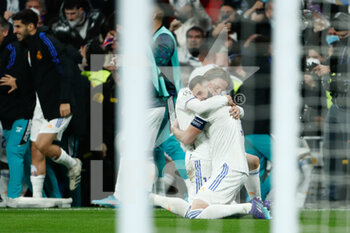 2022-03-09 - Karim Benzema of Real Madrid celebrates a goal with Luka Modric during the UEFA Champions League, round of 16 - second leg, football match played between Real Madrid and Paris Saint Germain - PSG at Santiago Bernabeu stadium on March 09, 2022, in Madrid, Spain. - REAL MADRID VS PARIS SAINT-GERMAIN - UEFA CHAMPIONS LEAGUE - SOCCER
