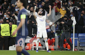 2022-03-09 - Karim Benzema of Real Madrid celebrates his third goal during the UEFA Champions League, Round of 16, 2nd leg football match between Real Madrid and Paris Saint-Germain (PSG) on March 9, 2022 at Santiago Bernabeu stadium in Madrid, Spain - REAL MADRID VS PARIS SAINT-GERMAIN - UEFA CHAMPIONS LEAGUE - SOCCER