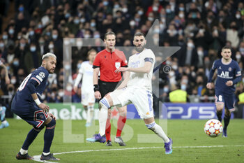 2022-03-09 - Karim Benzema of Real Madrid, Neymar Jr of PSG (left) during the UEFA Champions League, Round of 16, 2nd leg football match between Real Madrid and Paris Saint-Germain (PSG) on March 9, 2022 at Santiago Bernabeu stadium in Madrid, Spain - REAL MADRID VS PARIS SAINT-GERMAIN - UEFA CHAMPIONS LEAGUE - SOCCER