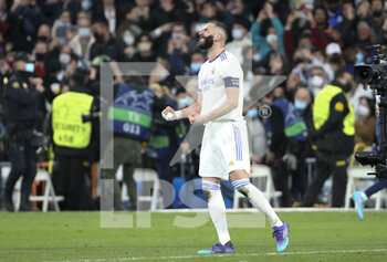 2022-03-09 - Karim Benzema of Real Madrid celebrates the victory following the UEFA Champions League, Round of 16, 2nd leg football match between Real Madrid and Paris Saint-Germain (PSG) on March 9, 2022 at Santiago Bernabeu stadium in Madrid, Spain - REAL MADRID VS PARIS SAINT-GERMAIN - UEFA CHAMPIONS LEAGUE - SOCCER