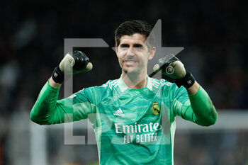 2022-03-09 - Thibaut Courtois of Real Madrid celebrates the victory during the UEFA Champions League, Round of 16, 2nd leg football match between Real Madrid and Paris Saint-Germain on March 9, 2022 at Santiago Bernabeu stadium in Madrid, Spain - REAL MADRID VS PARIS SAINT-GERMAIN - UEFA CHAMPIONS LEAGUE - SOCCER
