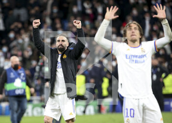 2022-03-09 - Daniel Carvajal, Luka Modric of Real Madrid and teammates celebrate the victory following the UEFA Champions League, Round of 16, 2nd leg football match between Real Madrid and Paris Saint-Germain (PSG) on March 9, 2022 at Santiago Bernabeu stadium in Madrid, Spain - REAL MADRID VS PARIS SAINT-GERMAIN - UEFA CHAMPIONS LEAGUE - SOCCER