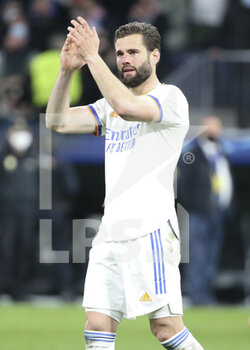 2022-03-09 - Nacho Fernandez of Real Madrid celebrates the victory following the UEFA Champions League, Round of 16, 2nd leg football match between Real Madrid and Paris Saint-Germain (PSG) on March 9, 2022 at Santiago Bernabeu stadium in Madrid, Spain - REAL MADRID VS PARIS SAINT-GERMAIN - UEFA CHAMPIONS LEAGUE - SOCCER