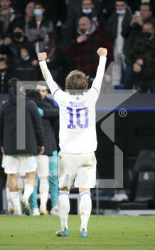 2022-03-09 - Luka Modric of Real Madrid celebrates the victory following the UEFA Champions League, Round of 16, 2nd leg football match between Real Madrid and Paris Saint-Germain (PSG) on March 9, 2022 at Santiago Bernabeu stadium in Madrid, Spain - REAL MADRID VS PARIS SAINT-GERMAIN - UEFA CHAMPIONS LEAGUE - SOCCER