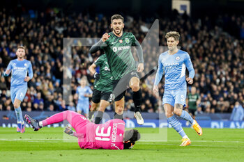 2022-03-09 - Ederson (31) of Manchester City makes a save from Paulinho (21) of Sporting CP during the UEFA Champions League, Round of 16, 2nd leg football match between Manchester City and Sporting Lisbon on March 9, 2022 at the Etihad Stadium in Manchester, England - MANCHESTER CITY VS SPORTING LISBON - UEFA CHAMPIONS LEAGUE - SOCCER