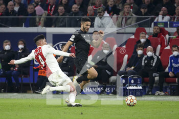 2022-03-15 - Goncalo Ramos of Benfica, Edson Alvarez of Ajax (left) during the UEFA Champions League, Round of 16, 2nd leg football match between AFC AJAX Amsterdam and SL Benfica Lisbon on March 15, 2022 at Johan Cruijff ArenA in Amsterdam, Netherlands - AFC AJAX AMSTERDAM VS SL BENFICA LISBON - UEFA CHAMPIONS LEAGUE - SOCCER