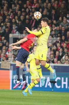 2022-03-16 - Duel on the air Andreas Christensen Chelsea and Gabriel Gudmundsson Losc during the UEFA Champions League, Round of 16, 2nd leg football match between LOSC Lille and Chelsea on March 16, 2022 at Pierre Mauroy stadium in Villeneuve-d'Ascq, France - LOSC LILLE VS CHELSEA - UEFA CHAMPIONS LEAGUE - SOCCER