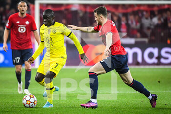 2022-03-16 - N'Golo KANTE of Chelsea and Gabriel GUDMUNDSSON of Lille during the UEFA Champions League, Round of 16, 2nd leg football match between LOSC Lille and Chelsea on March 16, 2022 at Pierre Mauroy stadium in Villeneuve-d'Ascq, France - LOSC LILLE VS CHELSEA - UEFA CHAMPIONS LEAGUE - SOCCER