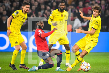 2022-03-16 - Jonathan BAMBA of Lille and Marcos ALONSO of Chelsea during the UEFA Champions League, Round of 16, 2nd leg football match between LOSC Lille and Chelsea on March 16, 2022 at Pierre Mauroy stadium in Villeneuve-d'Ascq, France - LOSC LILLE VS CHELSEA - UEFA CHAMPIONS LEAGUE - SOCCER