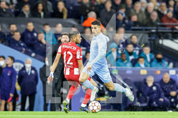 2022-04-05 - Joao Cancelo (27) of Manchester City and Renan Lodi of Atletico Madrid during the UEFA Champions League, Quarter-finals, 1st leg football match between Manchester City and Atletico Madrid on April 5, 2022 at the Etihad Stadium in Manchester, England - MANCHESTER CITY VS ATLETICO MADRID - UEFA CHAMPIONS LEAGUE - SOCCER