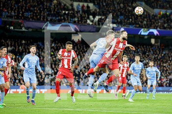 2022-04-05 - Felipe (18) of Atletico Madrid and John Stones of Manchester City during the UEFA Champions League, Quarter-finals, 1st leg football match between Manchester City and Atletico Madrid on April 5, 2022 at the Etihad Stadium in Manchester, England - MANCHESTER CITY VS ATLETICO MADRID - UEFA CHAMPIONS LEAGUE - SOCCER