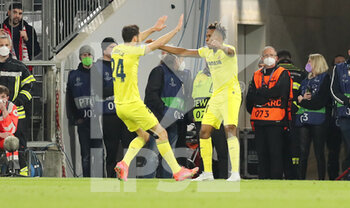2022-04-12 - Samuel Chukwueze of Villarreal celebrates after his goal 1-1 with Alfonso Pedraza during the UEFA Champions League, Quarter-finals, 2nd leg football match between Bayern Munich and Villarreal CF on April 12, 2022 at Allianz Arena in Munich, Germany - BAYERN MUNICH VS VILLARREAL CF - UEFA CHAMPIONS LEAGUE - SOCCER