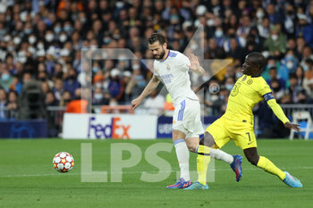 2022-04-12 - Nacho Fernandez of Real Madrid and N'Golo Kante of Chelsea during the UEFA Champions League, Quarter-finals, 2nd leg football match between Real Madrid and Chelsea on april 12, 2022 at Santiago Bernabeu stadium in Madrid, Spain - REAL MADRID VS CHELSEA - UEFA CHAMPIONS LEAGUE - SOCCER
