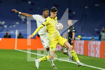 2022-04-12 - David Alaba of Real Madrid and Kai Havertz of Chelsea during the UEFA Champions League, Quarter-finals, 2nd leg football match between Real Madrid and Chelsea on april 12, 2022 at Santiago Bernabeu stadium in Madrid, Spain - REAL MADRID VS CHELSEA - UEFA CHAMPIONS LEAGUE - SOCCER