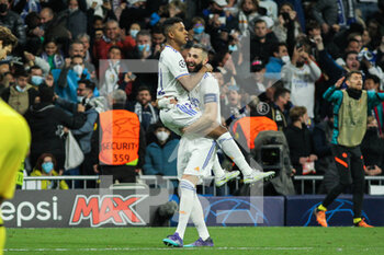 2022-04-12 - Rodrygo Silva De Goes celebrates a goal with Karim Benzema of Real Madrid during the UEFA Champions League, Quarter-finals, 2nd leg football match between Real Madrid and Chelsea on april 12, 2022 at Santiago Bernabeu stadium in Madrid, Spain - REAL MADRID VS CHELSEA - UEFA CHAMPIONS LEAGUE - SOCCER