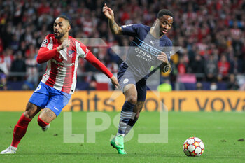 2022-04-13 - Raheem Sterling of Manchester City and Matheus Cunha of Atletico de Madrid during the UEFA Champions League, Quarter-finals, 2nd leg football match between Atletico de Madrid and Manchester City on April 13, 2022 at Wanda Metropolitano stadium in Madrid, Spain - ATLETICO DE MADRID VS MANCHESTER CITY - UEFA CHAMPIONS LEAGUE - SOCCER