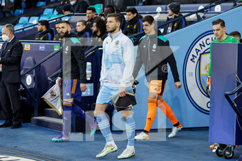 2022-04-26 - Ruben Dias (3) of Manchester City leads the team out during the UEFA Champions League, Semi-finals, 1st leg football match between Manchester City and Real Madrid on April 26, 2022 at the Etihad Stadium in Manchester, England - MANCHESTER CITY VS REAL MADRID - UEFA CHAMPIONS LEAGUE - SOCCER