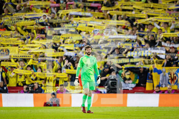 2022-04-27 - Liverpool goalkeeper Alisson Becker (1) in front of Villarreal fans, supporters during the UEFA Champions League, Semi-finals, 1st leg football match between Liverpool FC and Villarreal CF on April 27, 2022 at Anfield stadium in Liverpool, England - LIVERPOOL FC VS VILLARREAL CF - UEFA CHAMPIONS LEAGUE - SOCCER