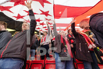 2022-04-27 - Liverpool fans, supporters passing a giant banner above their heads before the UEFA Champions League, Semi-finals, 1st leg football match between Liverpool FC and Villarreal CF on April 27, 2022 at Anfield stadium in Liverpool, England - LIVERPOOL FC VS VILLARREAL CF - UEFA CHAMPIONS LEAGUE - SOCCER