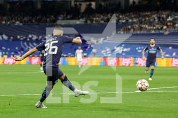 2022-05-04 - Riyad Mahrez (26) of Manchester City scores a goal 0-1 during the UEFA Champions League, Semi-finals, 2nd leg football match between Real Madrid and Manchester City on May 4, 2022 at the Santiago Bernabeu Stadium in Madrid, Spain - REAL MADRID VS MANCHESTER CITY - UEFA CHAMPIONS LEAGUE - SOCCER