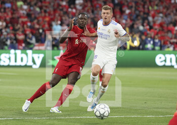 2022-05-28 - Ibrahima Konate of Liverpool, Toni Kroos of Real Madrid during the UEFA Champions League Final football match between Liverpool FC and Real Madrid CF on May 28, 2022 at Stade de France in Saint-Denis near Paris, France - FOOTBALL - CHAMPIONS LEAGUE - FINAL - LIVERPOOL V REAL MADRID - UEFA CHAMPIONS LEAGUE - SOCCER