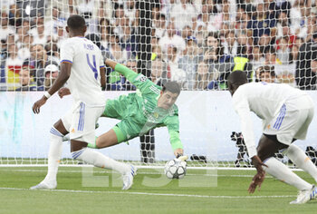 2022-05-28 - Goalkeeper of Real Madrid Thibaut Courtois makes a save during the UEFA Champions League Final football match between Liverpool FC and Real Madrid CF on May 28, 2022 at Stade de France in Saint-Denis near Paris, France - FOOTBALL - CHAMPIONS LEAGUE - FINAL - LIVERPOOL V REAL MADRID - UEFA CHAMPIONS LEAGUE - SOCCER