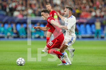 2022-05-28 - Diogo Jota (20) of Liverpool battles with Daniel Carvajal (2) of Real Madrid during the UEFA Champions League, Final football match between Liverpool FC and Real Madrid CF on May 28, 2022 at Stade de France in Saint-Denis near Paris, France - FOOTBALL - CHAMPIONS LEAGUE - FINAL - LIVERPOOL V REAL MADRID - UEFA CHAMPIONS LEAGUE - SOCCER