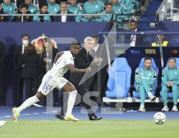 2022-05-28 - Vinicius Junior of Real Madrid, coach of Real Madrid Carlo Ancelotti during the UEFA Champions League Final football match between Liverpool FC and Real Madrid CF on May 28, 2022 at Stade de France in Saint-Denis near Paris, France - FOOTBALL - CHAMPIONS LEAGUE - FINAL - LIVERPOOL V REAL MADRID - UEFA CHAMPIONS LEAGUE - SOCCER