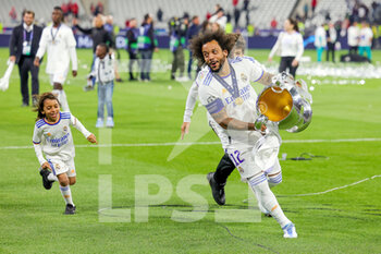 2022-05-28 - Marcelo (12) of Real Madrid celebrates at full time during the UEFA Champions League, Final football match between Liverpool FC and Real Madrid CF on May 28, 2022 at Stade de France in Saint-Denis near Paris, France - FOOTBALL - CHAMPIONS LEAGUE - FINAL - LIVERPOOL V REAL MADRID - UEFA CHAMPIONS LEAGUE - SOCCER