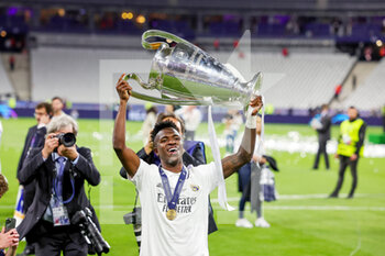 2022-05-28 - Vinicius Junior (20) of Real Madrid celebrates at full time during the UEFA Champions League, Final football match between Liverpool FC and Real Madrid CF on May 28, 2022 at Stade de France in Saint-Denis near Paris, France - FOOTBALL - CHAMPIONS LEAGUE - FINAL - LIVERPOOL V REAL MADRID - UEFA CHAMPIONS LEAGUE - SOCCER