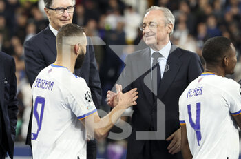 2022-05-28 - President of Real Madrid Florentino Perez, Karim Benzema of Real Madrid during the trophy ceremony following the UEFA Champions League Final football match between Liverpool FC and Real Madrid CF on May 28, 2022 at Stade de France in Saint-Denis near Paris, France - FOOTBALL - CHAMPIONS LEAGUE - FINAL - LIVERPOOL V REAL MADRID - UEFA CHAMPIONS LEAGUE - SOCCER
