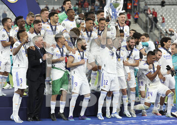 2022-05-28 - Marcelo Vieira da Silva of Real Madrid holding the cup and teammates celebrate during the trophy ceremony following the UEFA Champions League Final football match between Liverpool FC and Real Madrid CF on May 28, 2022 at Stade de France in Saint-Denis near Paris, France - FOOTBALL - CHAMPIONS LEAGUE - FINAL - LIVERPOOL V REAL MADRID - UEFA CHAMPIONS LEAGUE - SOCCER