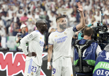 2022-05-28 - Karim Benzema, Ferland Mendy (left) of Real Madrid during the celebration following the UEFA Champions League Final football match between Liverpool FC and Real Madrid CF on May 28, 2022 at Stade de France in Saint-Denis near Paris, France - FOOTBALL - CHAMPIONS LEAGUE - FINAL - LIVERPOOL V REAL MADRID - UEFA CHAMPIONS LEAGUE - SOCCER