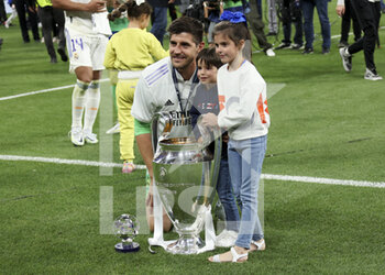 2022-05-28 - Goalkeeper of Real Madrid Thibaut Courtois and his kids during the celebration following the UEFA Champions League Final football match between Liverpool FC and Real Madrid CF on May 28, 2022 at Stade de France in Saint-Denis near Paris, France - FOOTBALL - CHAMPIONS LEAGUE - FINAL - LIVERPOOL V REAL MADRID - UEFA CHAMPIONS LEAGUE - SOCCER