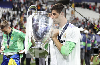 2022-05-28 - Goalkeeper of Real Madrid Thibaut Courtois during the celebration following the UEFA Champions League Final football match between Liverpool FC and Real Madrid CF on May 28, 2022 at Stade de France in Saint-Denis near Paris, France - FOOTBALL - CHAMPIONS LEAGUE - FINAL - LIVERPOOL V REAL MADRID - UEFA CHAMPIONS LEAGUE - SOCCER