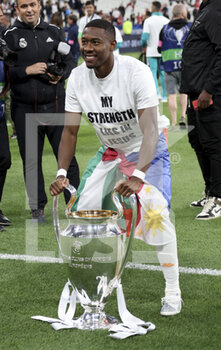 2022-05-28 - David Alaba of Real Madrid during the celebration following the UEFA Champions League Final football match between Liverpool FC and Real Madrid CF on May 28, 2022 at Stade de France in Saint-Denis near Paris, France - FOOTBALL - CHAMPIONS LEAGUE - FINAL - LIVERPOOL V REAL MADRID - UEFA CHAMPIONS LEAGUE - SOCCER