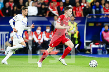 2022-05-28 - PARIS, FRANCE - MAY 28: Andy Robertson of Liverpool (R) runs with the ball during the UEFA Champions League final match between Liverpool FC and Real Madrid at Stade de France on May 28, 2022 in Paris, France. - LIVERPOOL FC V REAL MADRID - UEFA CHAMPIONS LEAGUE FINAL 2021/22 - UEFA CHAMPIONS LEAGUE - SOCCER