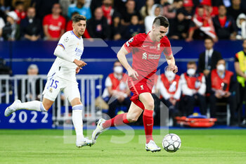 2022-05-28 - PARIS, FRANCE - MAY 28: Andy Robertson of Liverpool (R) runs with the ball during the UEFA Champions League final match between Liverpool FC and Real Madrid at Stade de France on May 28, 2022 in Paris, France. - LIVERPOOL FC V REAL MADRID - UEFA CHAMPIONS LEAGUE FINAL 2021/22 - UEFA CHAMPIONS LEAGUE - SOCCER