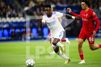 2022-05-28 - PARIS, FRANCE - MAY 28: Vinicius Junior of Real Madrid CF (L) is chased by Trent Alexander-Arnold of Liverpool (R) during the UEFA Champions League final match between Liverpool FC and Real Madrid at Stade de France on May 28, 2022 in Paris, France. - LIVERPOOL FC V REAL MADRID - UEFA CHAMPIONS LEAGUE FINAL 2021/22 - UEFA CHAMPIONS LEAGUE - SOCCER